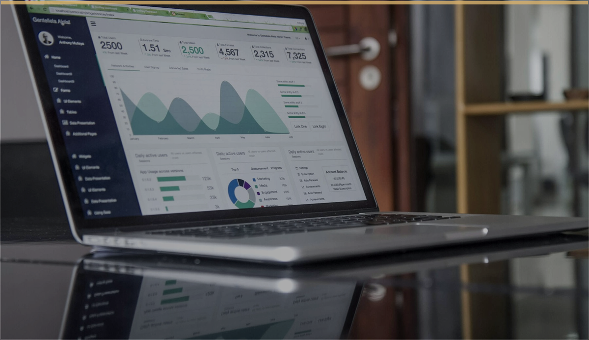 Laptop showing business analytics for identity access review